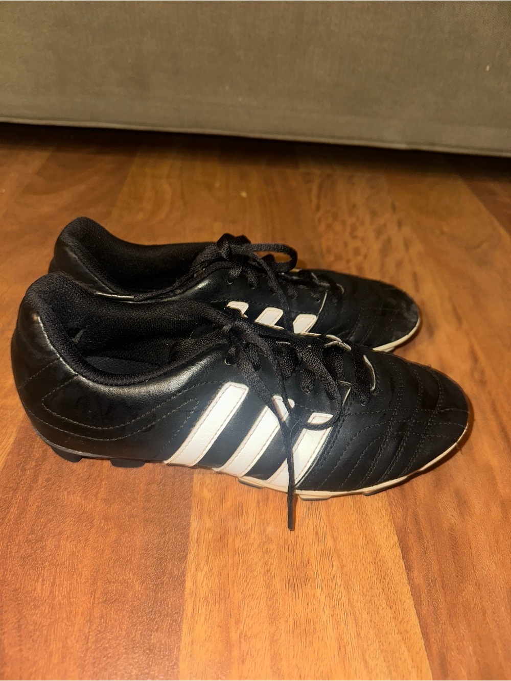 Adidas Kid’s Black Soccer Cleats with White Stripes
